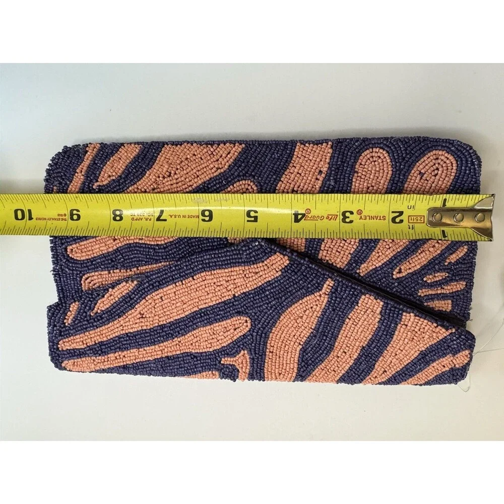 On 34th hand-beaded envelope clutch -navy and coral pink zebra stripe design